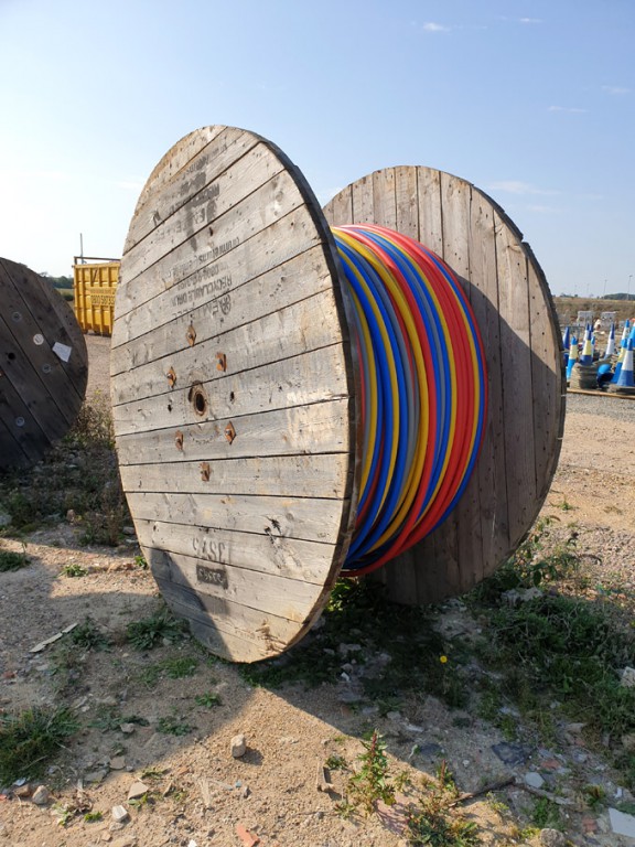 Emtelle cable drum with various Emtelle coloured p...
