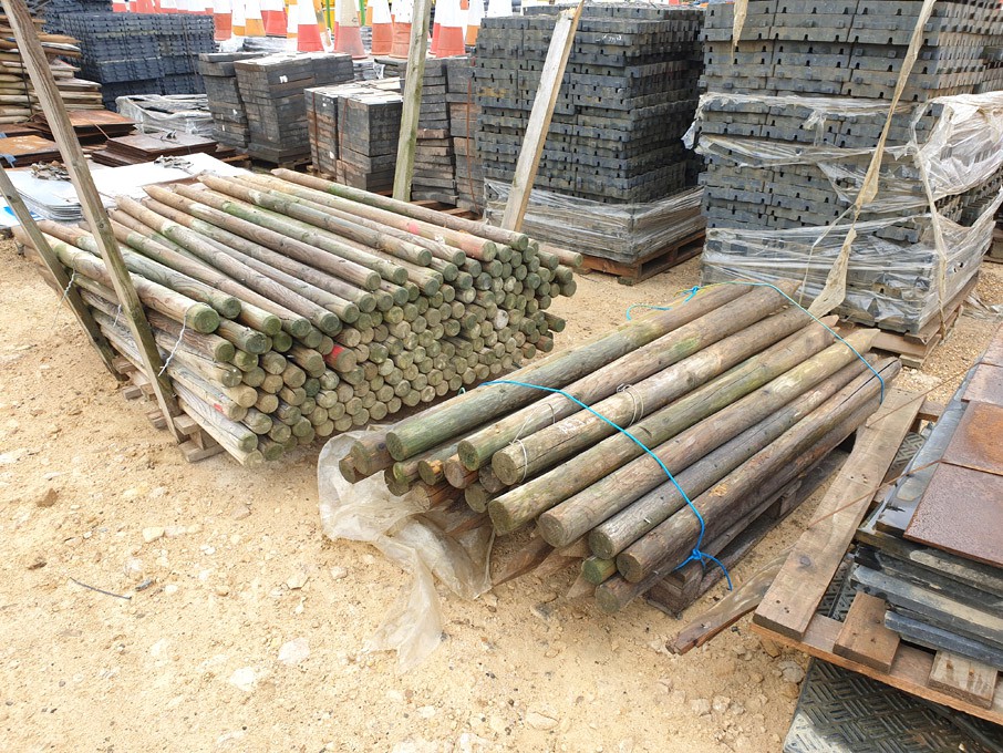 Qty various size wooden fence posts on 2 pallets