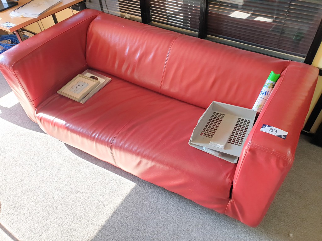 Red leather effect 2 seater sofa, 1800mm approx wi...