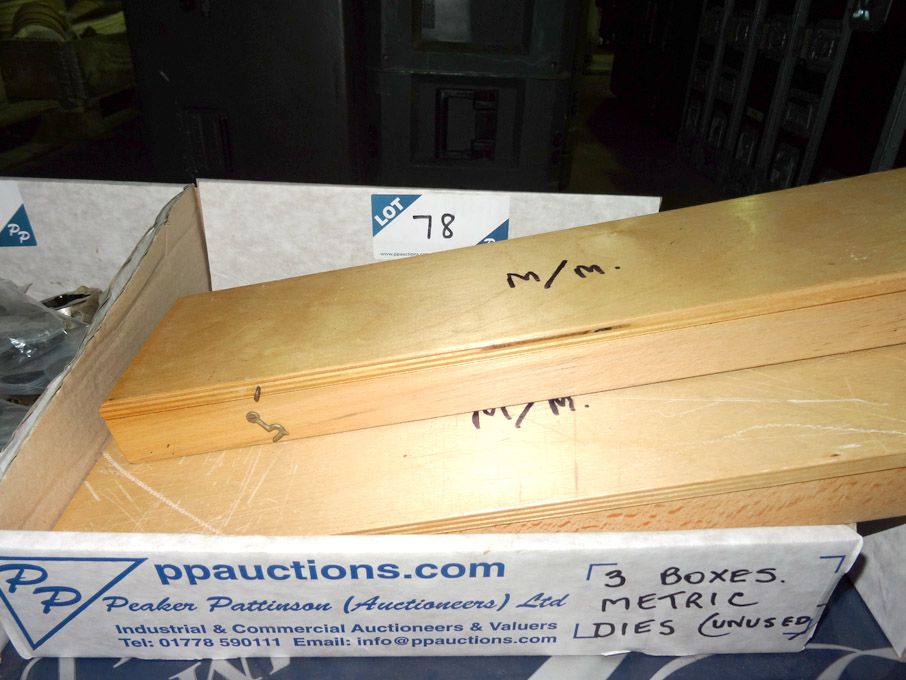 Qty various metric dies in 3 wooden boxes (unused)...