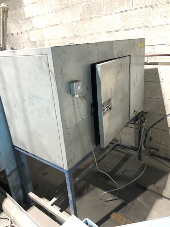 Twin hammer core knockout system in soundproof enc...