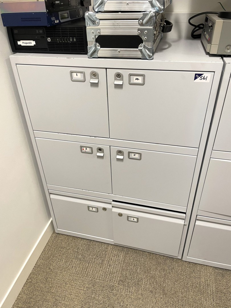 Grey metal storage cupboard inc: 4x locker compart...