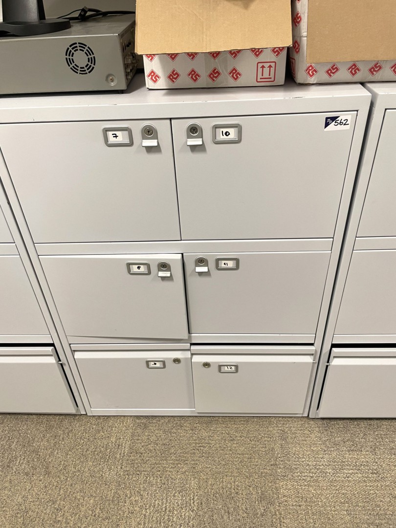 Grey metal storage cupboard inc: 4x locker compart...