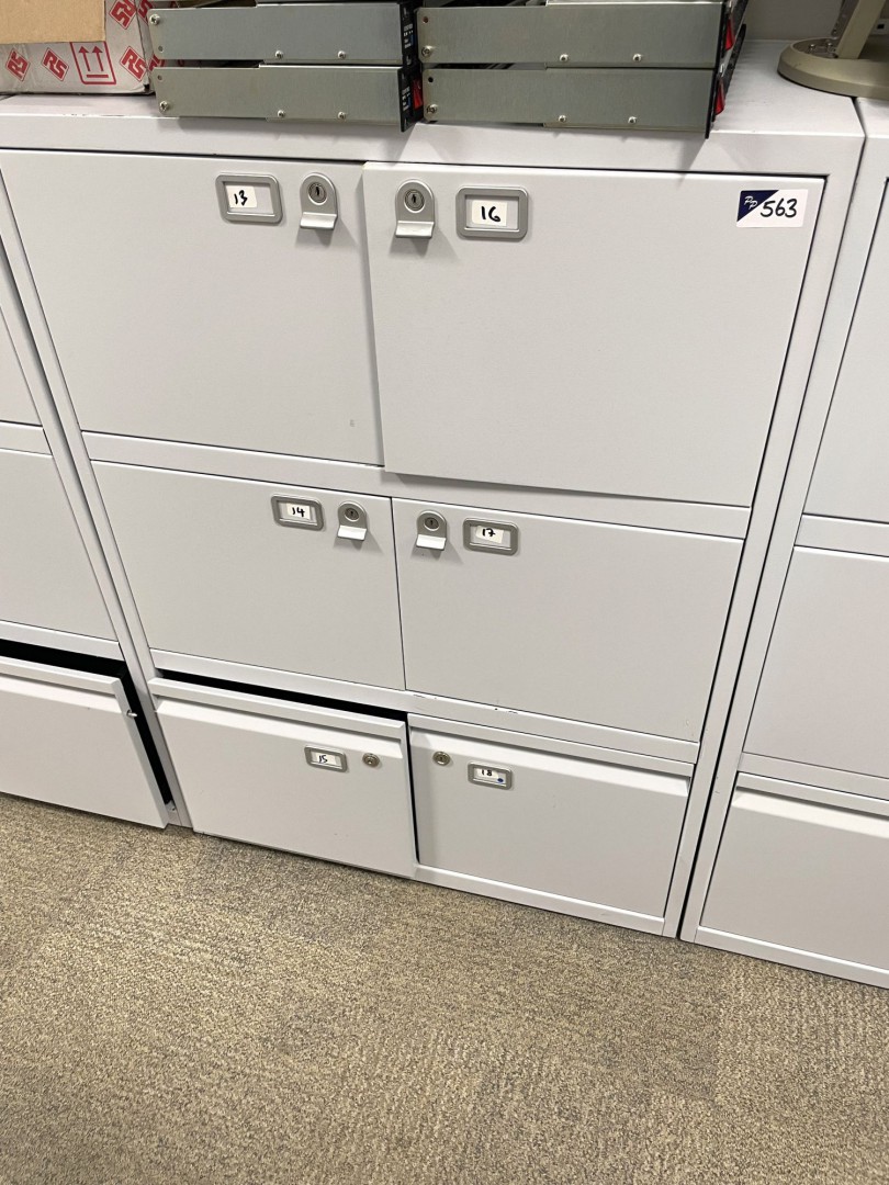 Grey metal storage cupboard inc: 4x locker compart...