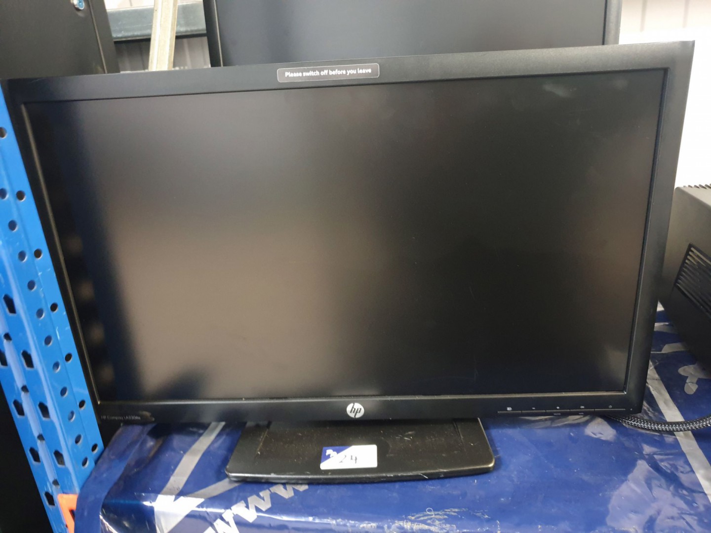 HP ZR2330W LCD monitor on stand, HP LA2306X LCD mo...