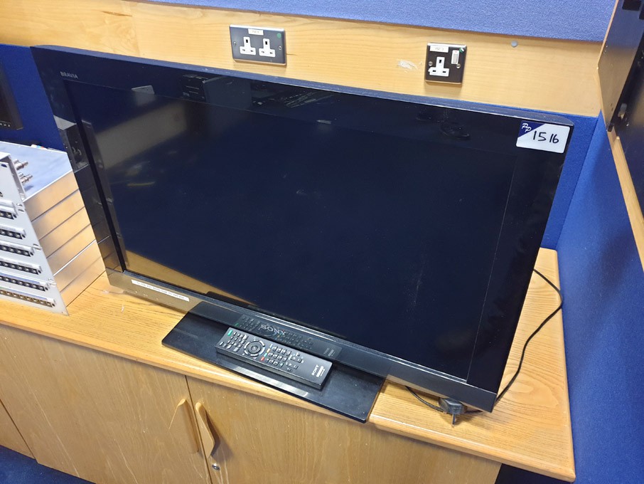 Sony Bravia KDL-32EX403 LCD TV on stand with remot...