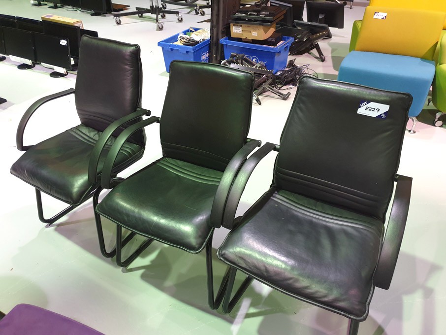 3x black leather effect meeting chairs