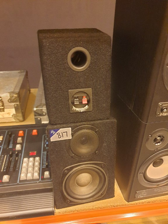 2x black fabric enclosed speakers
