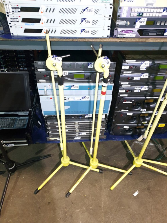 2x yellow free standing microphone stands