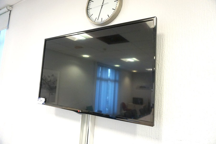 LG 42" wall mounted LCD TV with remote