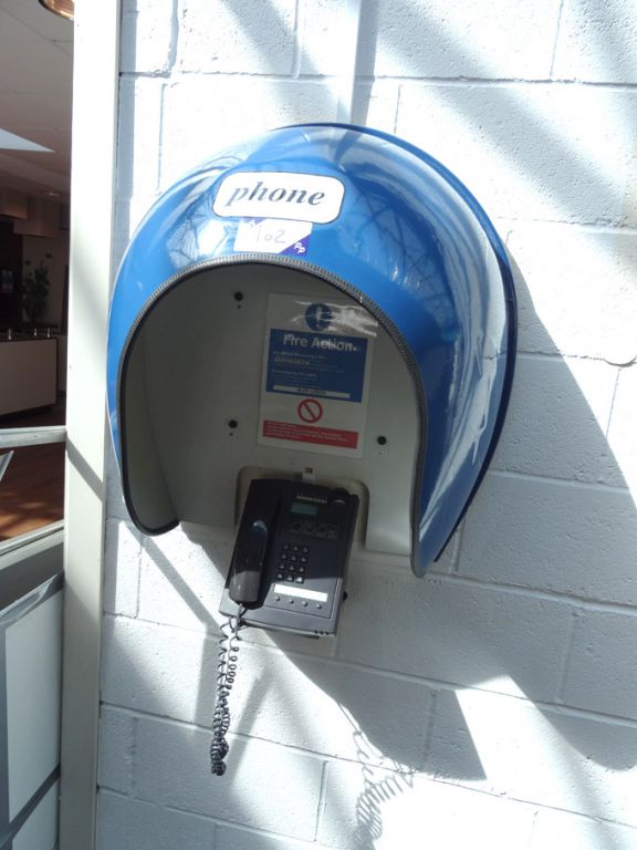 Solitaire 6000 payphone with sound hood