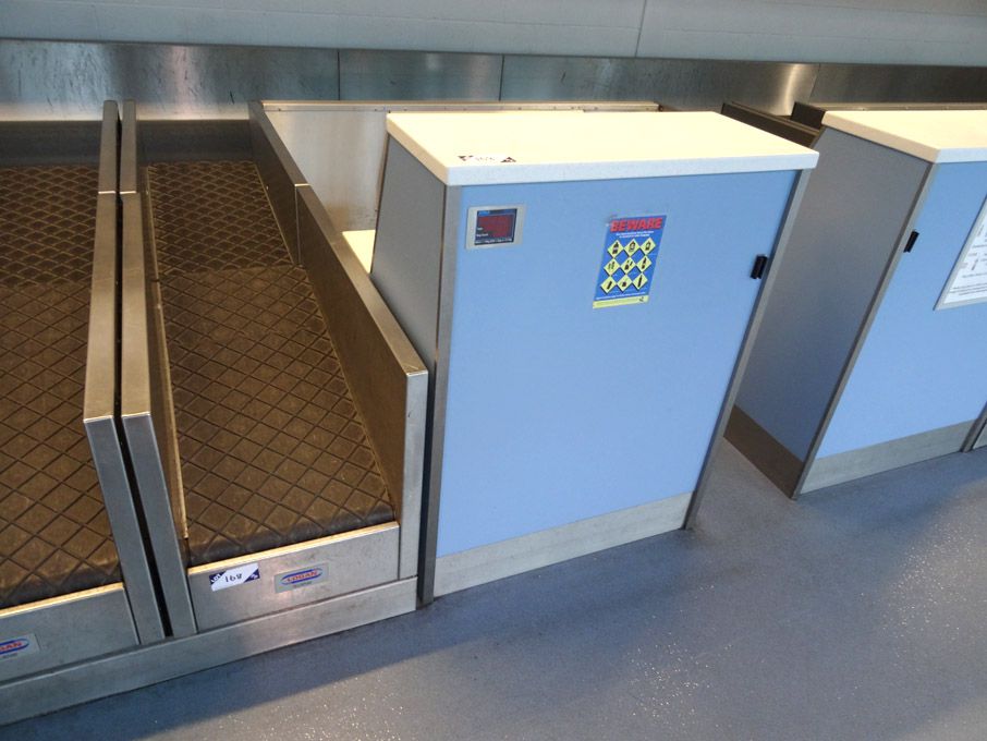 Check-in desk with Logan powered luggage conveyor,...