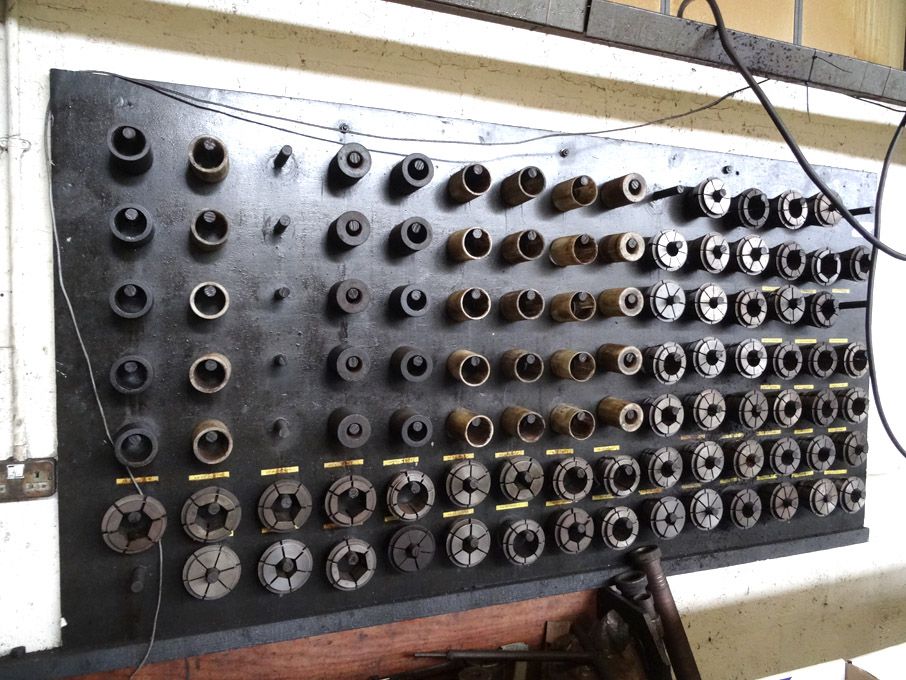 Qty various heavy duty collets on wall mounted rac...