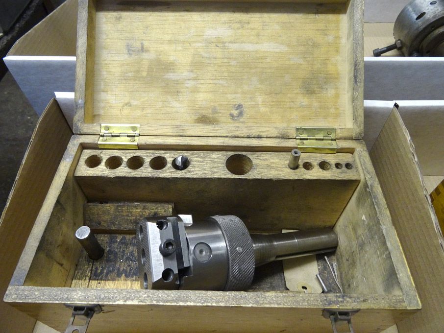 Universal boring head in wooden case