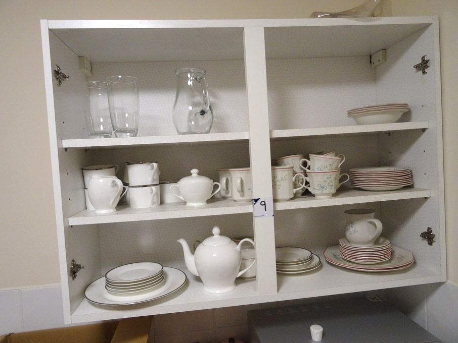 Contents of cupboard inc: plates, saucers, cups, j...