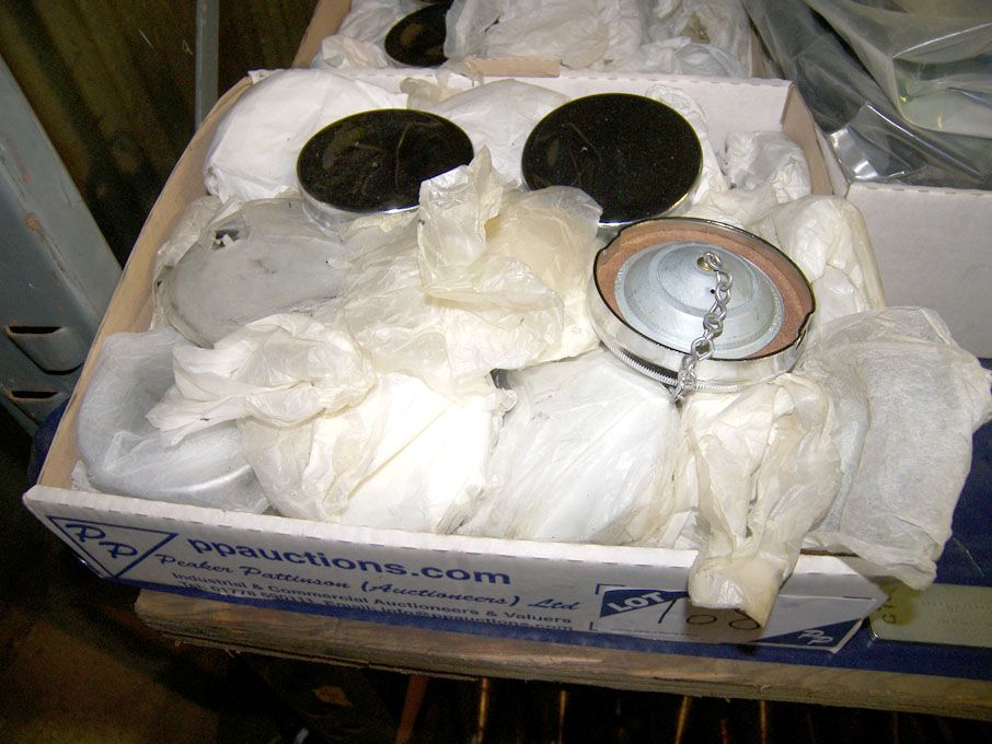 Qty chrome fuel caps in 2 boxes (unused)