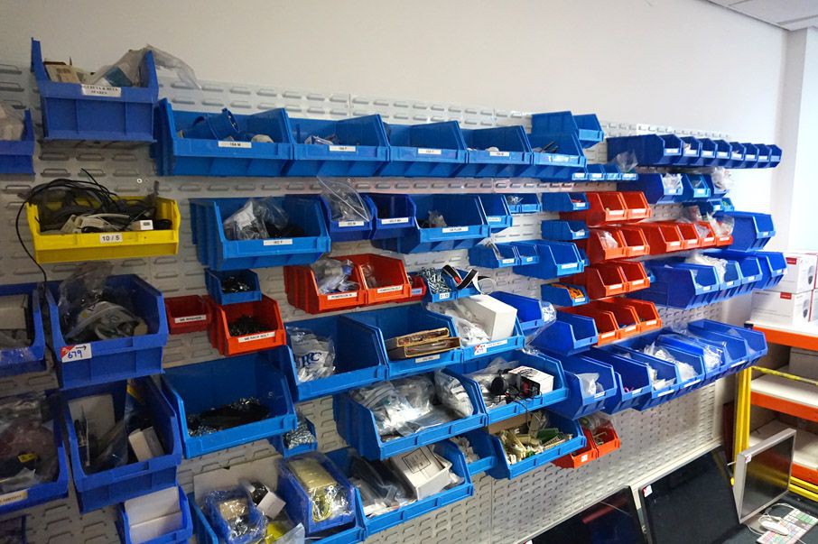 Large Qty various spares in wall mounted plastic s...