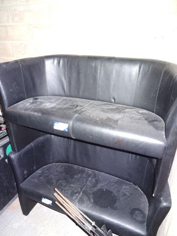 2x black 2 seater leather reception chairs