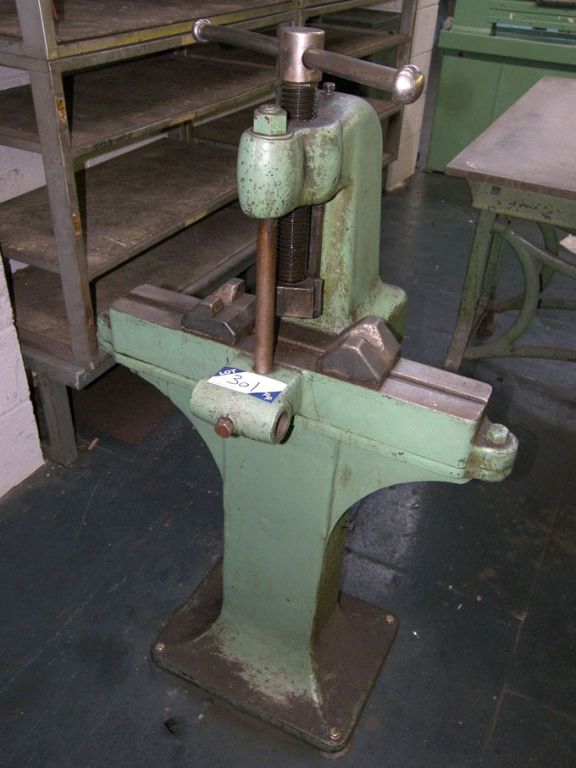 Manual lever press on base