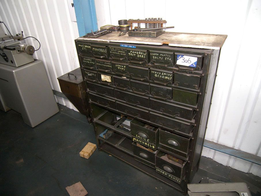 Multi compartment storage cabinet with contents in...