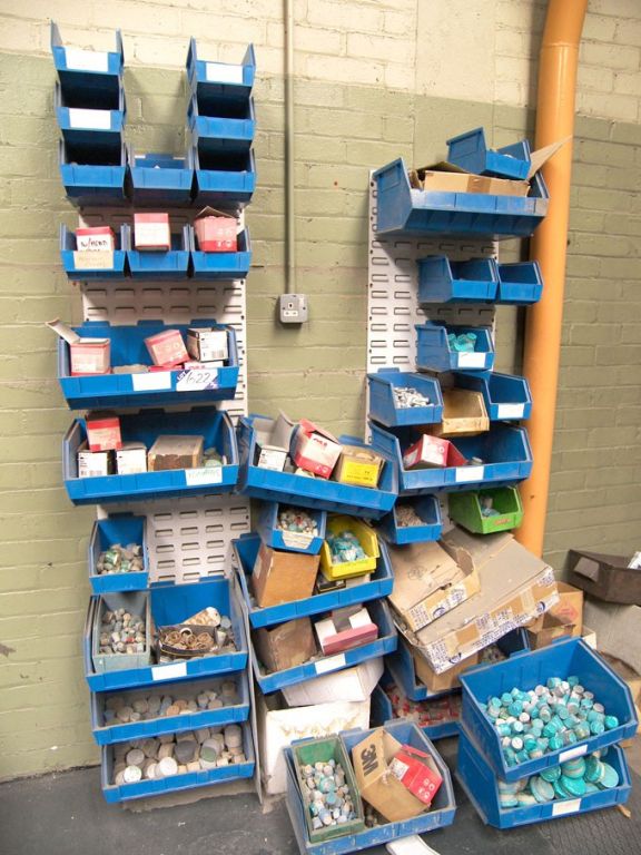 2x Wall type storage racks with Qty plastic storag...