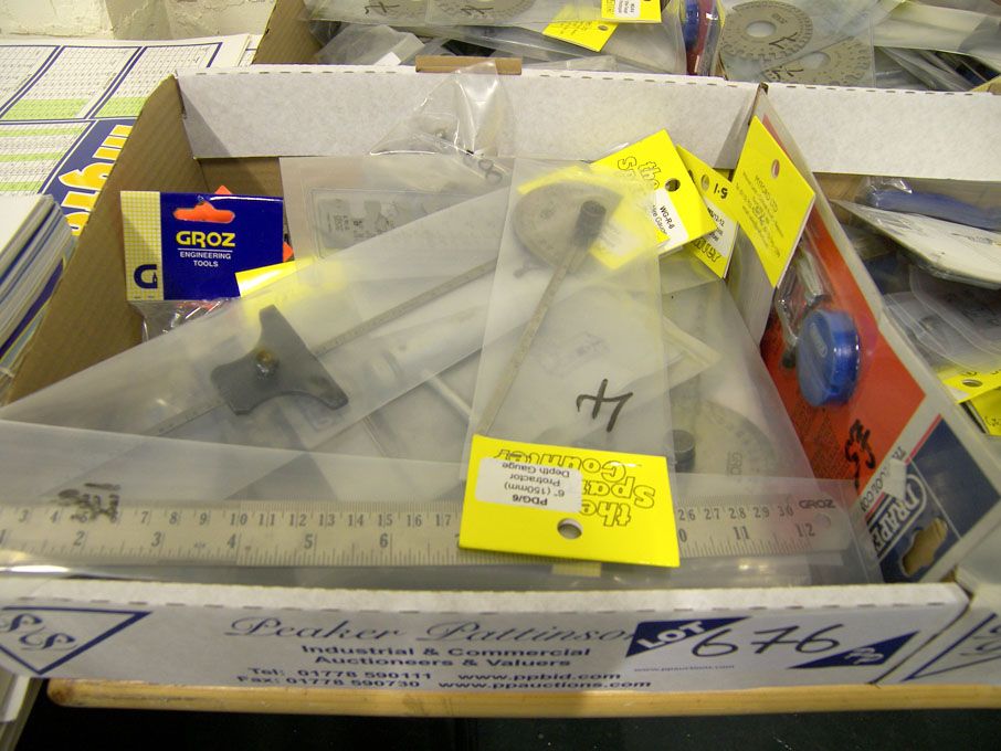 Qty pliers, tap wrench, rulers, 2" vice, mini hand...