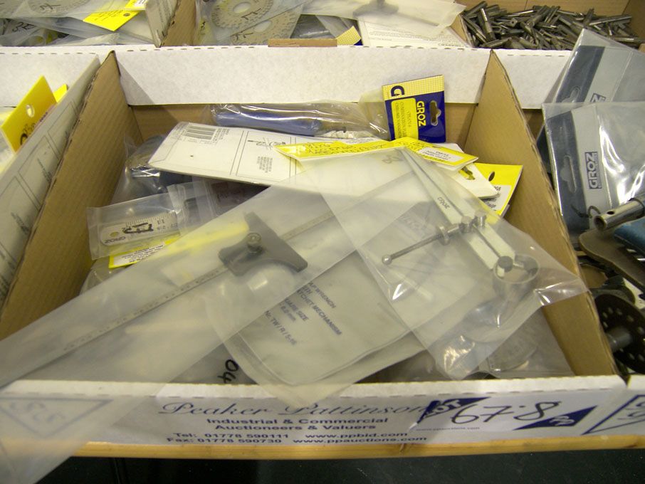 Qty pliers, tap wrench, rulers, 2" vice, mini hand...