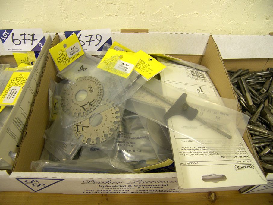 Qty pliers, tap wrench, rulers, 2" vice, mini hand...