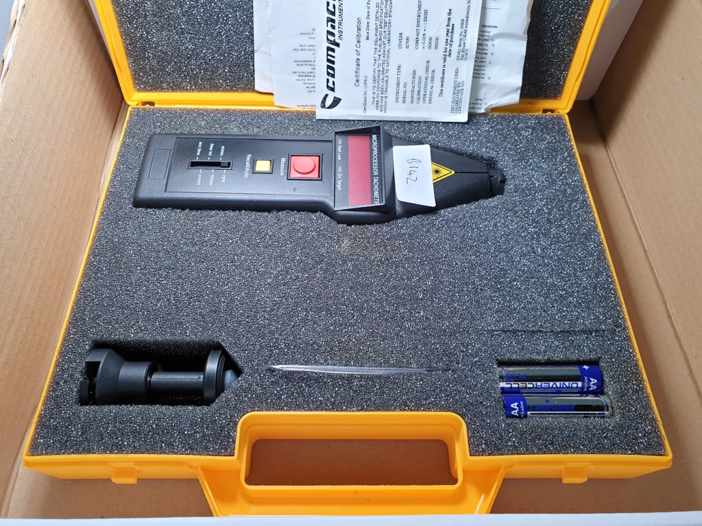 Compact CT6/LSR digital tachometer in yellow case...