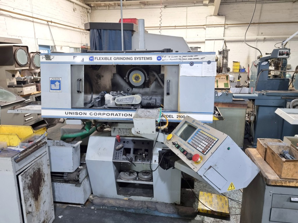 Unison Corporation 2100 CNC flexible grinding syst...