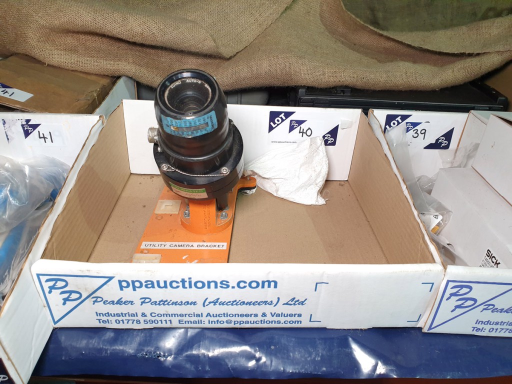 Camera lens on stand - Lot Located at: PP Saleroom...