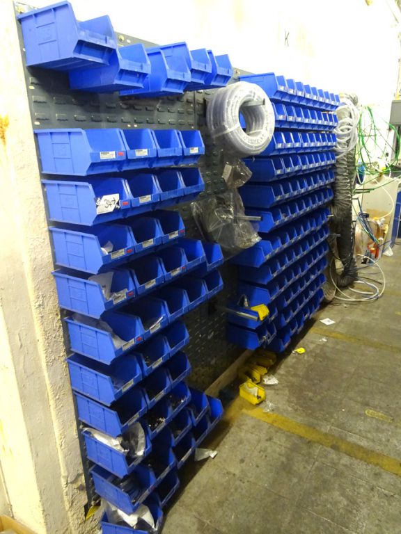Wall mounted plastic bin storage racks with conten...