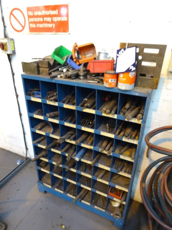 Multi-compartment storage cabinet with contents in...