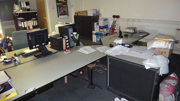 2x grey 'L' computer workstations with built in pe...