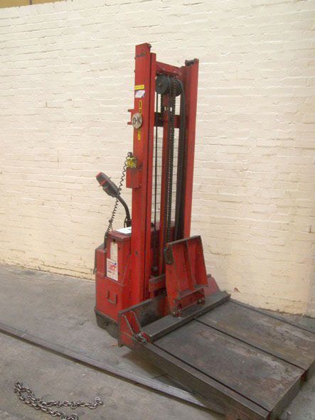 Wilmat Handling pedestrian walk along lift truck,...