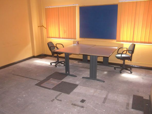 Contents of office inc: desks, chairs, white board...