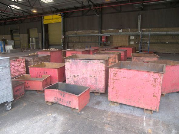 Qty (29 approx) solid sided red metal bins to 1100...