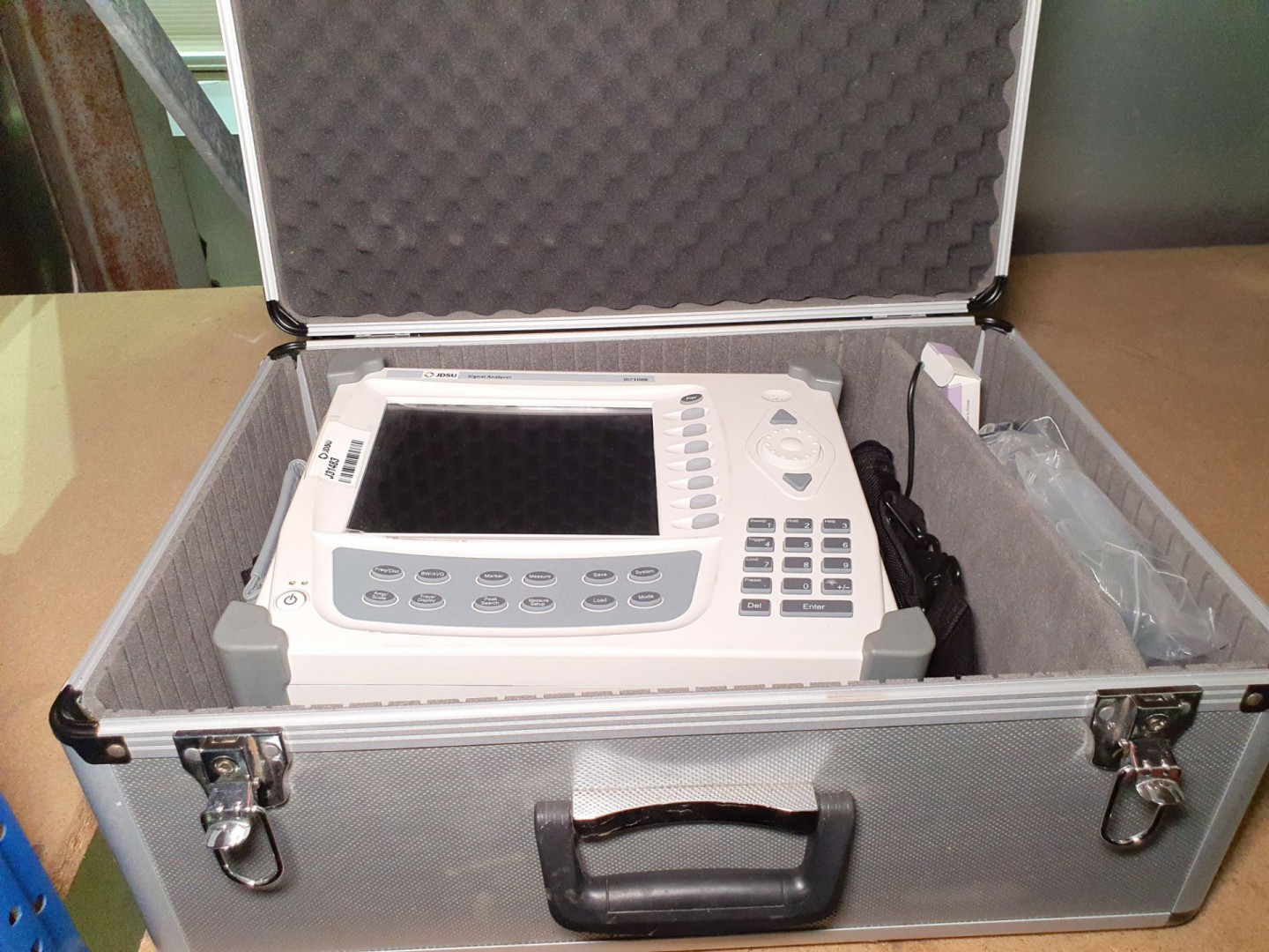 JDSU JD7108B signal analyser with equipment in tra...