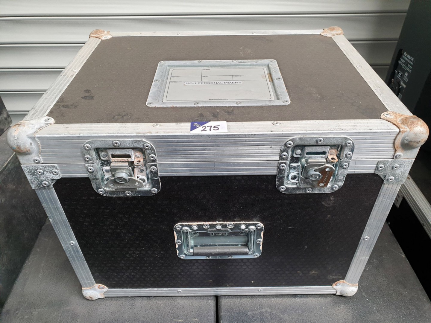 Black transit case with internal drawer, foam inse...