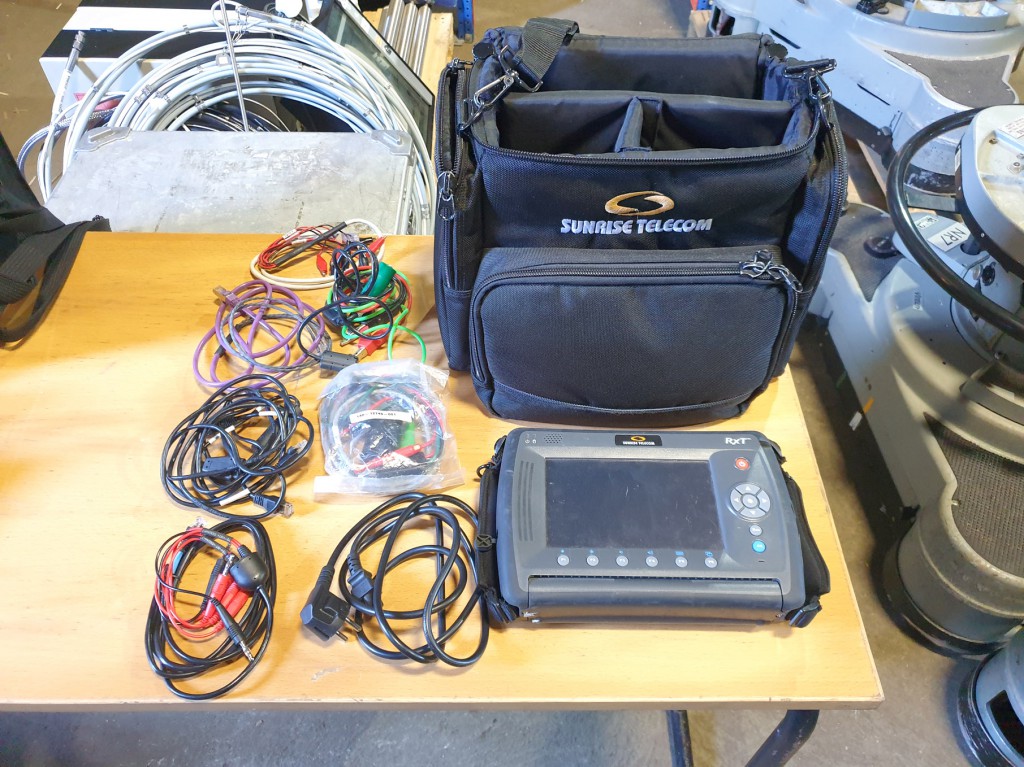 Sunrise Telecom RXT 1000 hand held tester in carry...