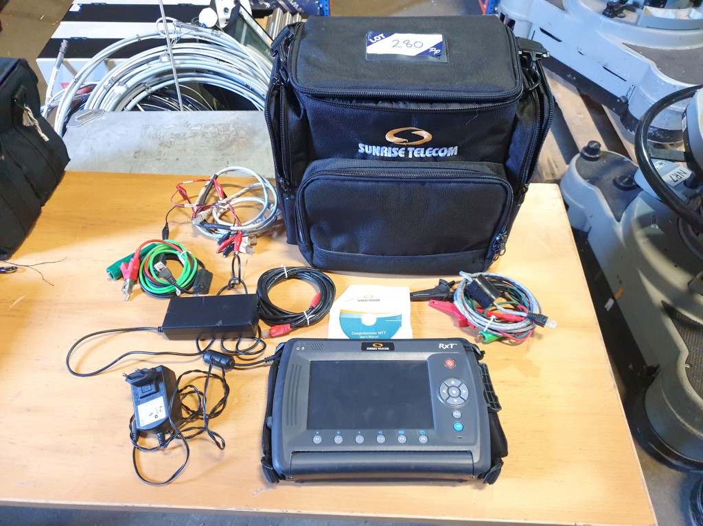 Sunrise Telecom RXT 1000 hand held tester in carry...