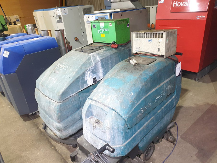 2x Tennant battery operated floor sweeper with cha...