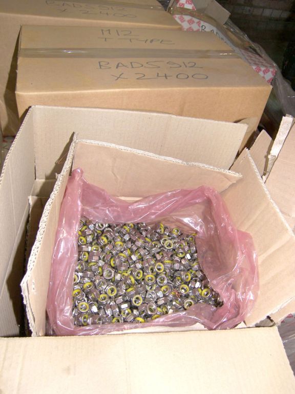 Stainless steel nuts (packaged & unused)