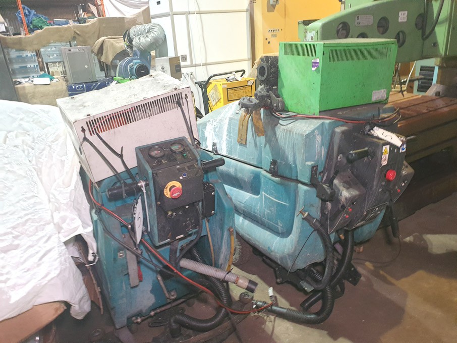 2x Tennant battery operated floor sweeper with cha...