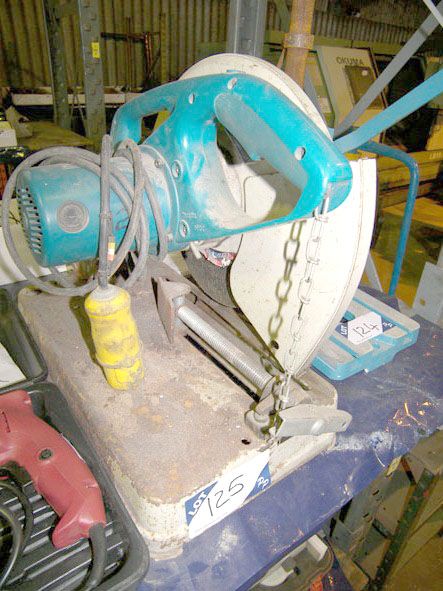 Makita 2414B 110v pull down saw - Located at PP St...