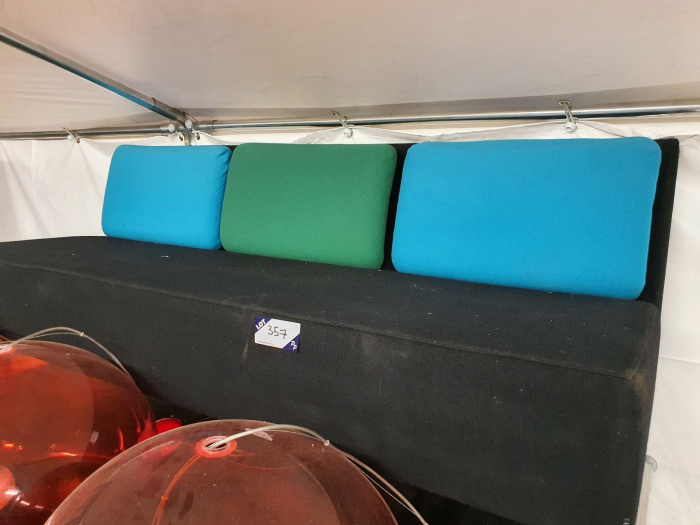 Black upholstered 3 seater sofa with multi coloure...