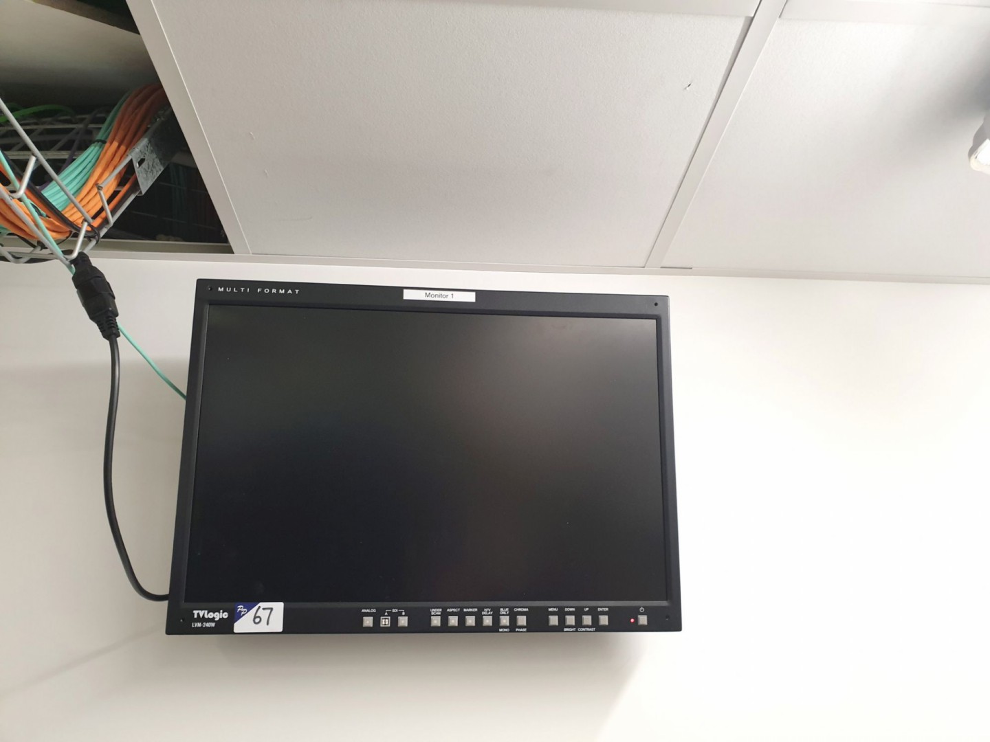 TV Logic LVM-240W multi format LCD monitor on wall...