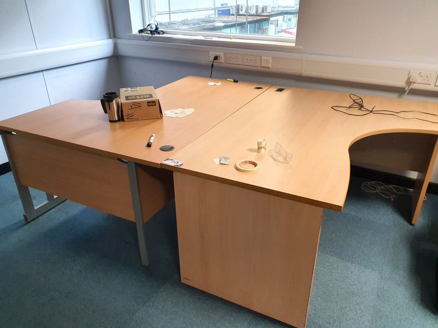 2x 1600x1200mm L-shape desks with sliding door cup...