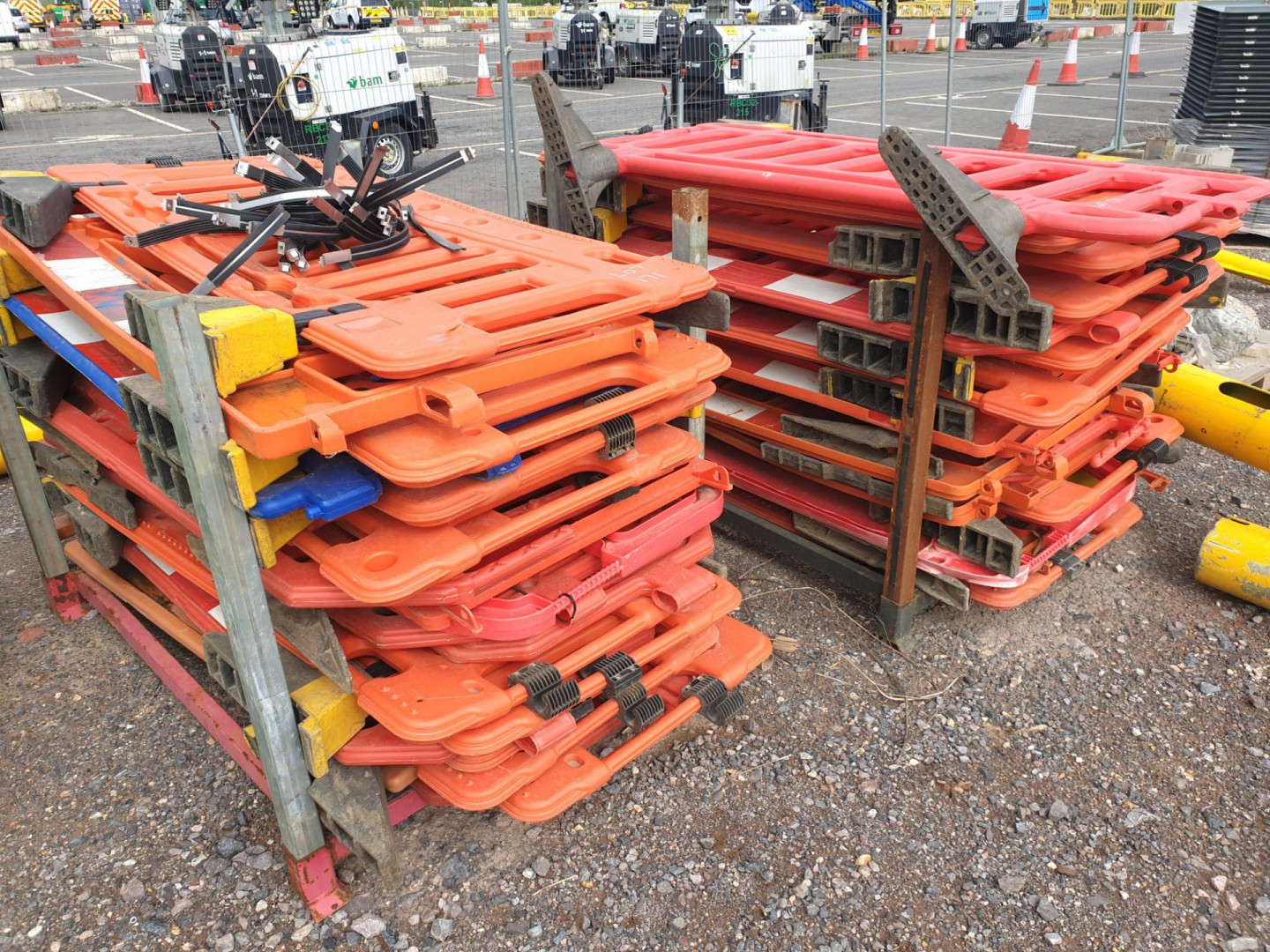 Qty various red safety barriers in 2 stillages