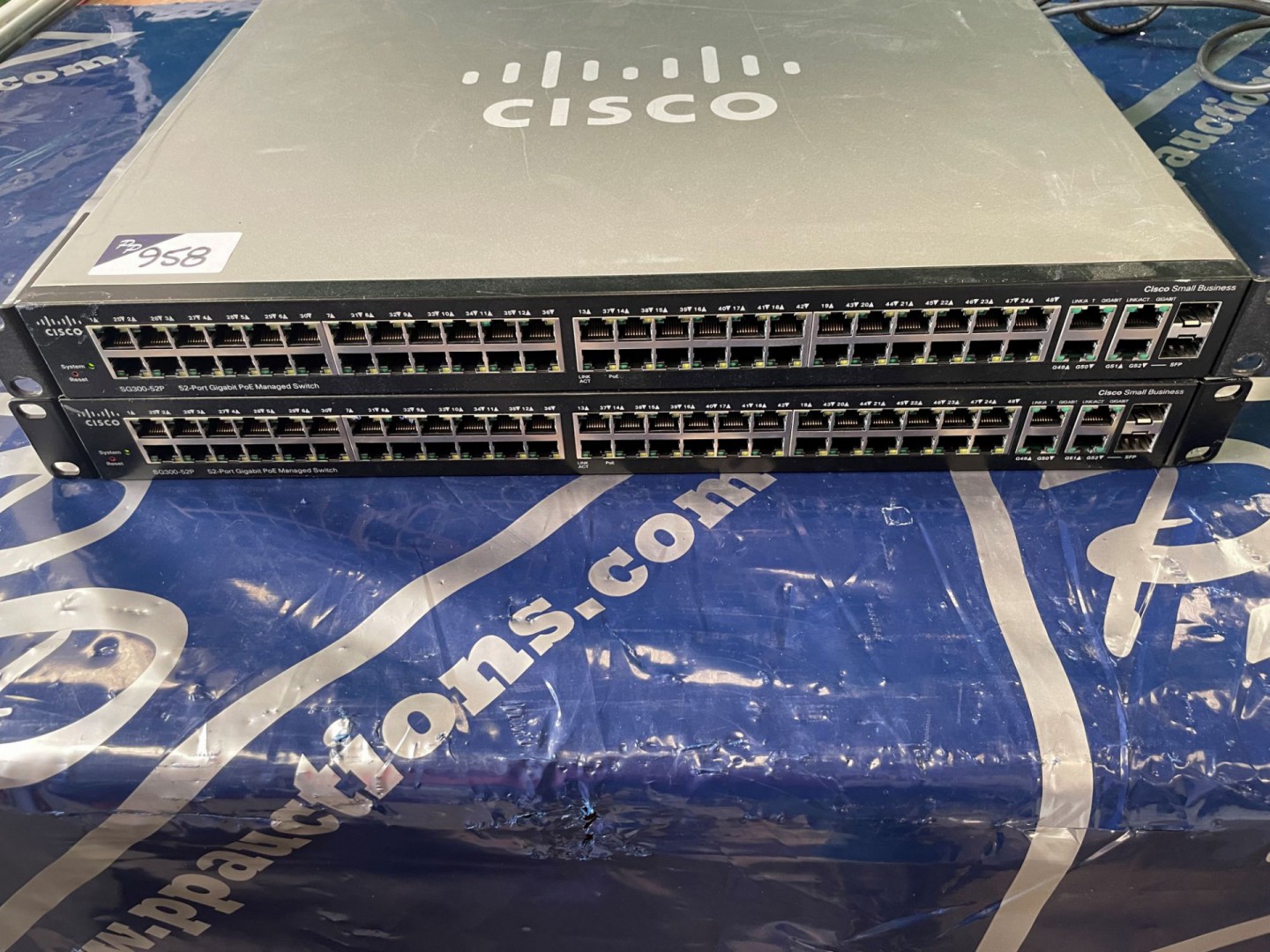 2x Cisco SG300-52P 52 port Gigabit PoE managed swi...